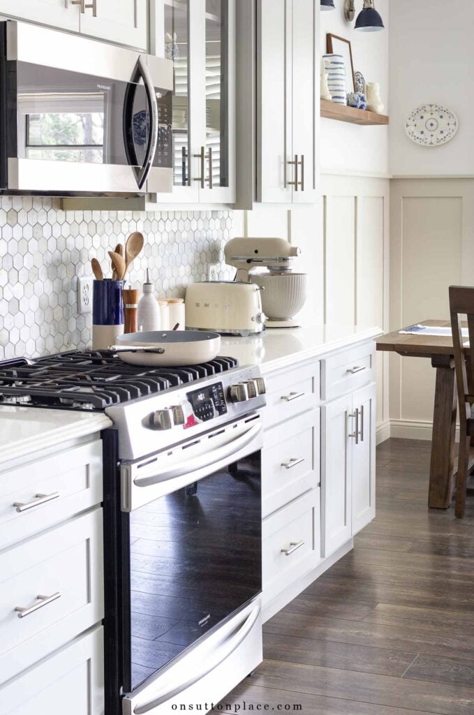 wall in kitchen with cabinets stove