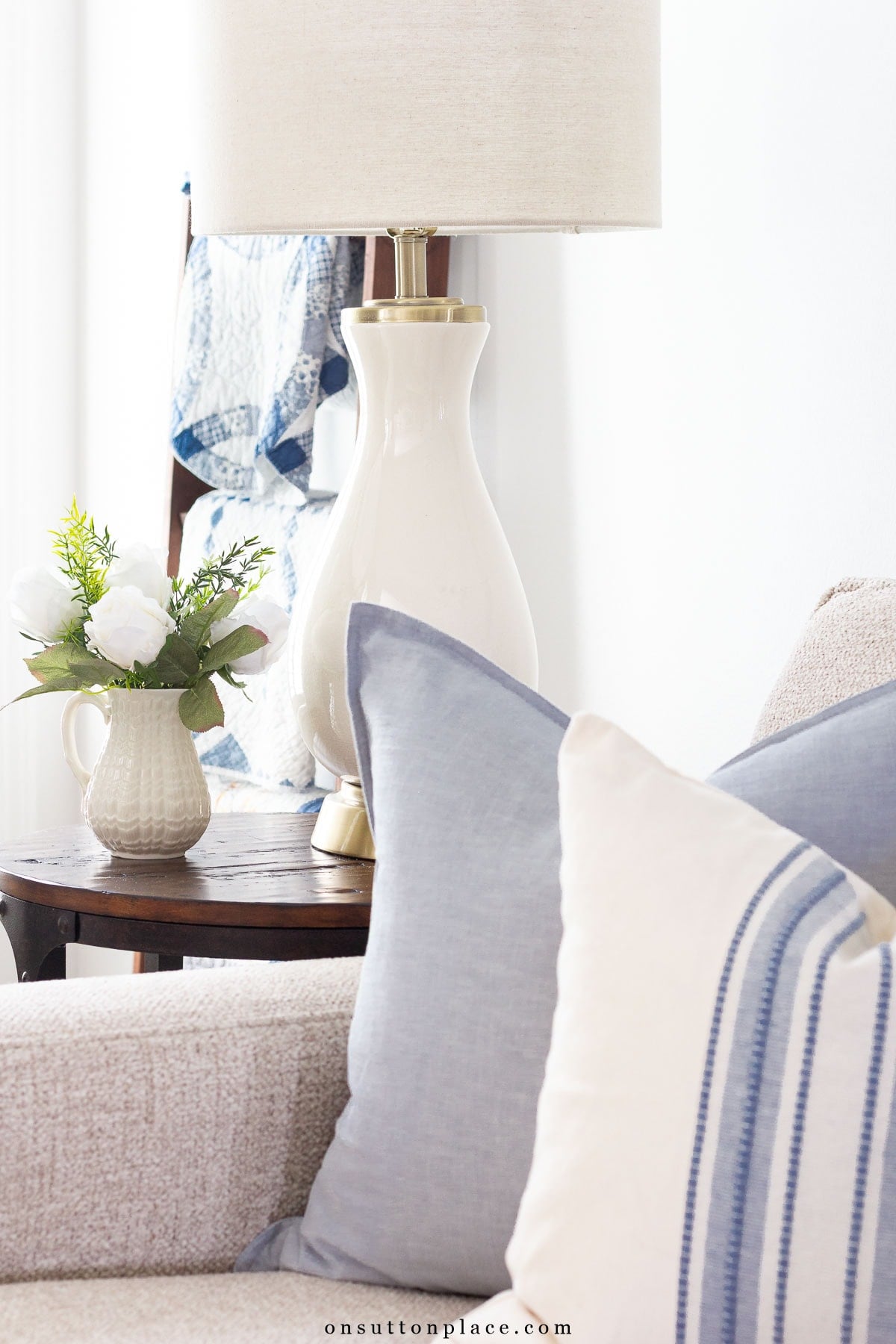 blue and white pillow covers on sofa summer living room ideas