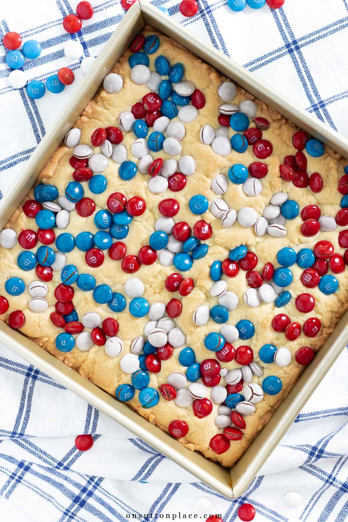 m&m cookie bars baked in square pan