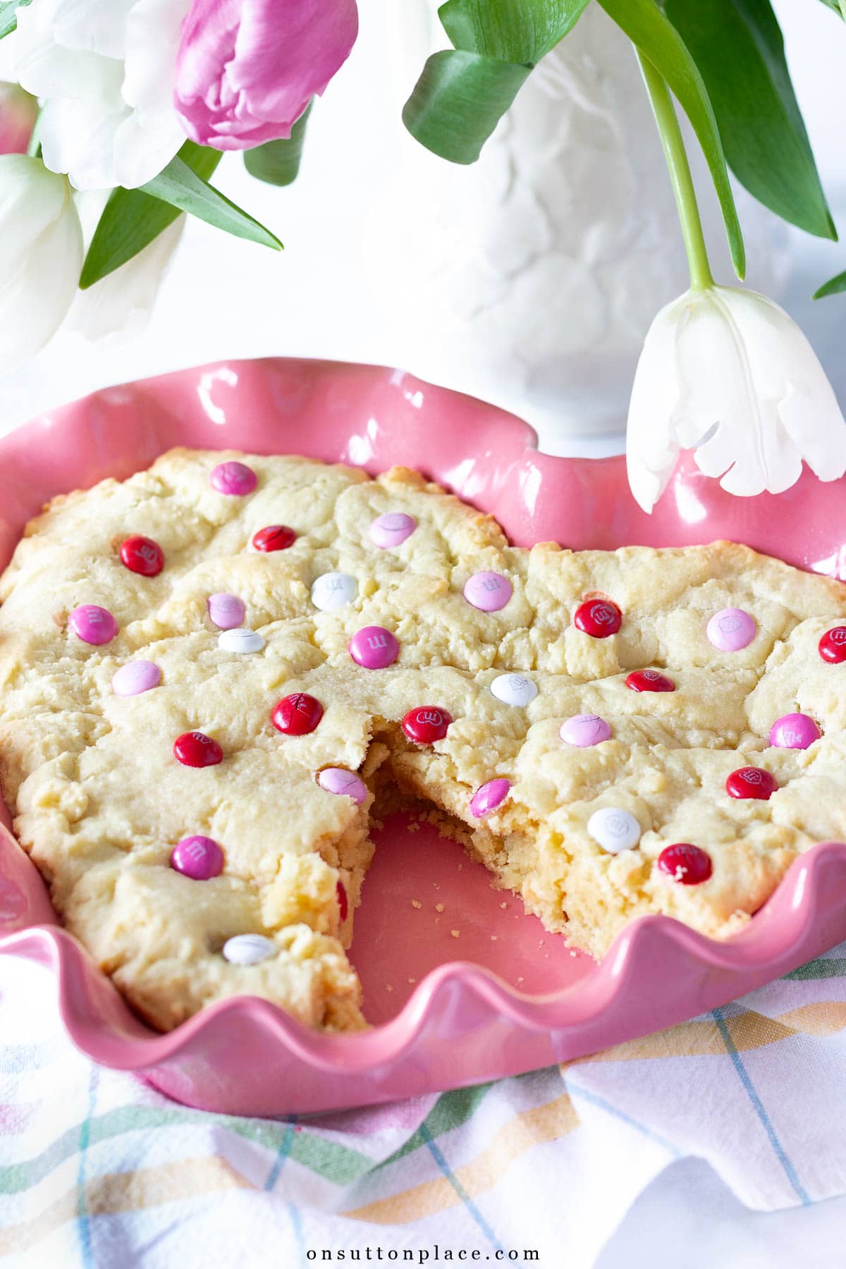 m&m cookie bars in heart baking dish valentine's day dessert