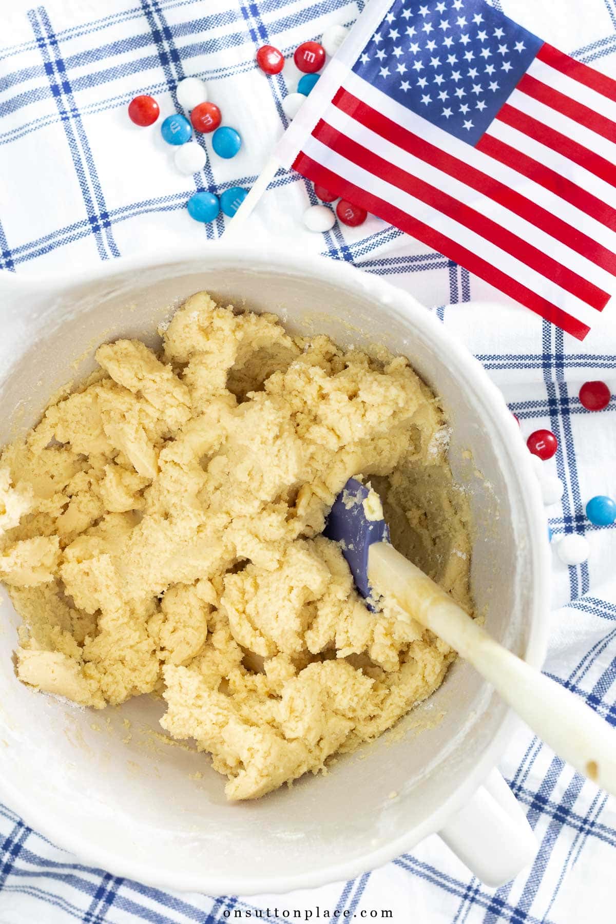 m&m cookie bars recipe batter in bowl