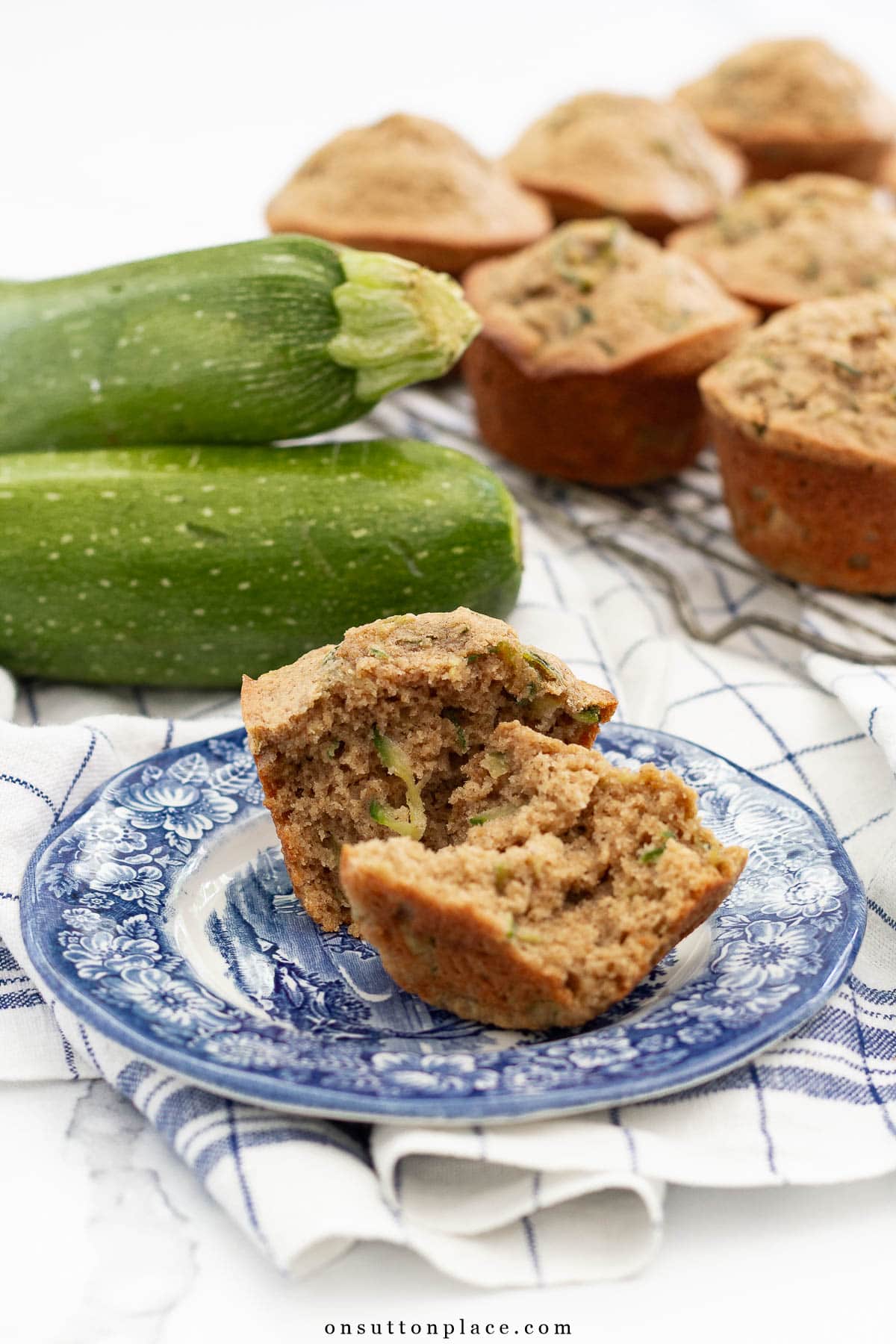 zucchini muffins recipe muffin on blue plate