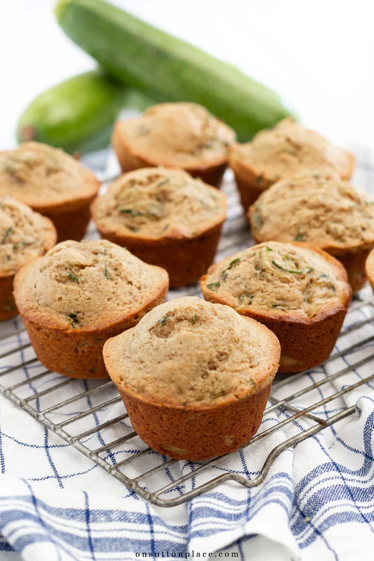 zucchini muffins recipe on cooling rack
