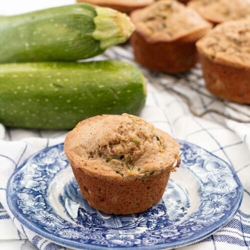 zucchini muffins recipe one muffin on plate
