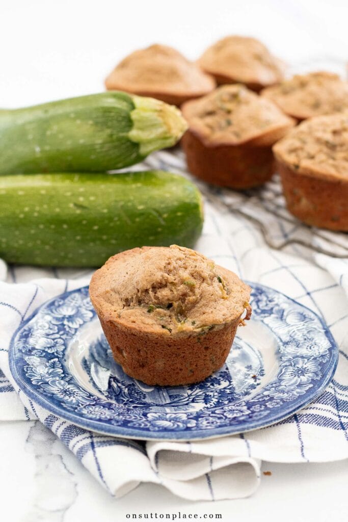 zucchini muffins recipe one muffin on plate
