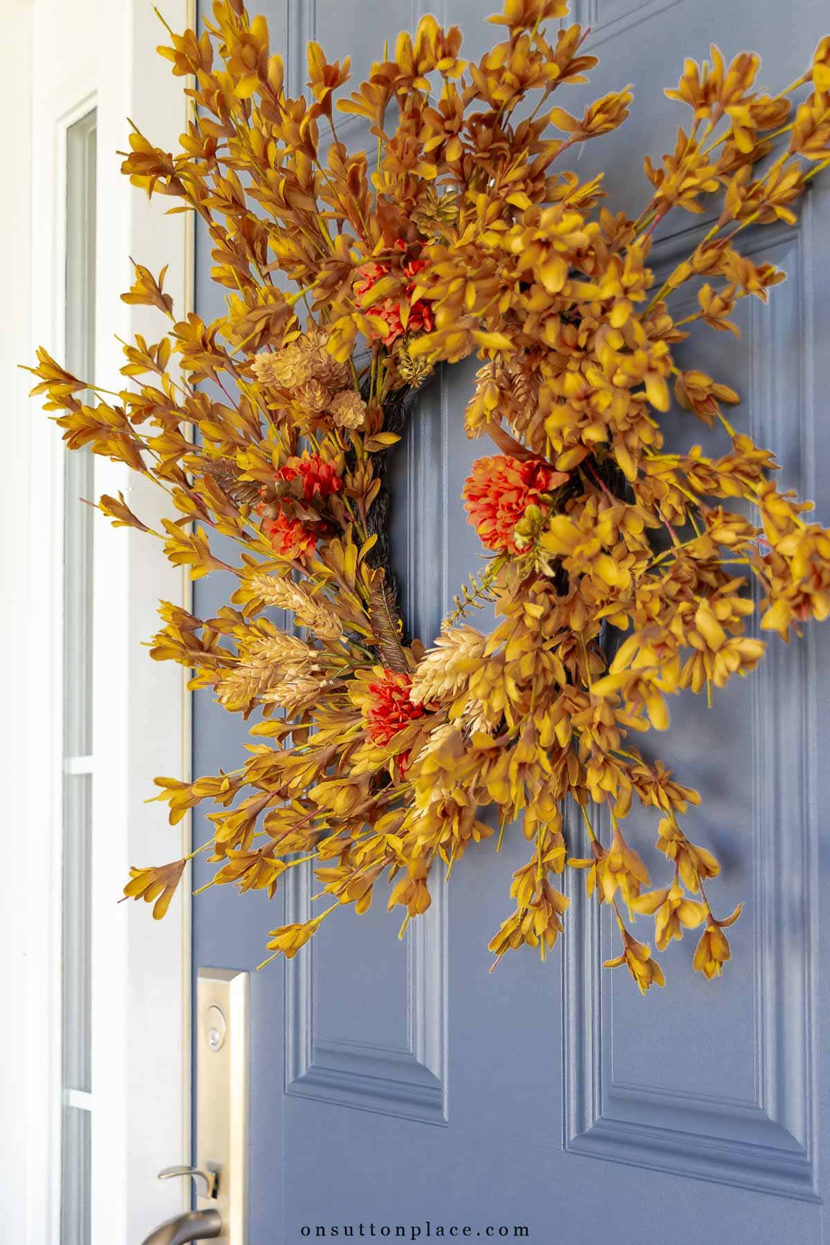 fall wreath on blue front door