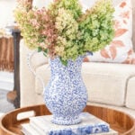 dried limelight hydrangeas in blue and white pitcher watercolor