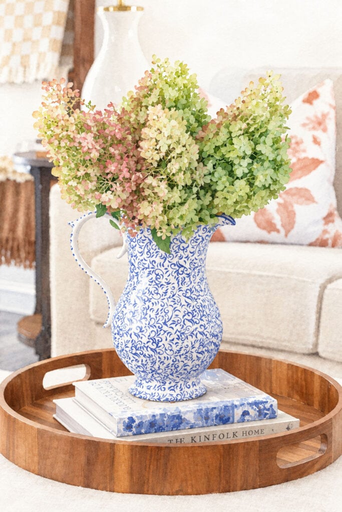 dried limelight hydrangeas in blue and white pitcher watercolor