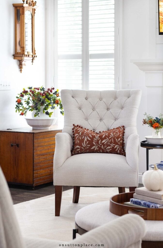 fall at home ideas rust pillow covers faux berries small white pumpkin on coffee table