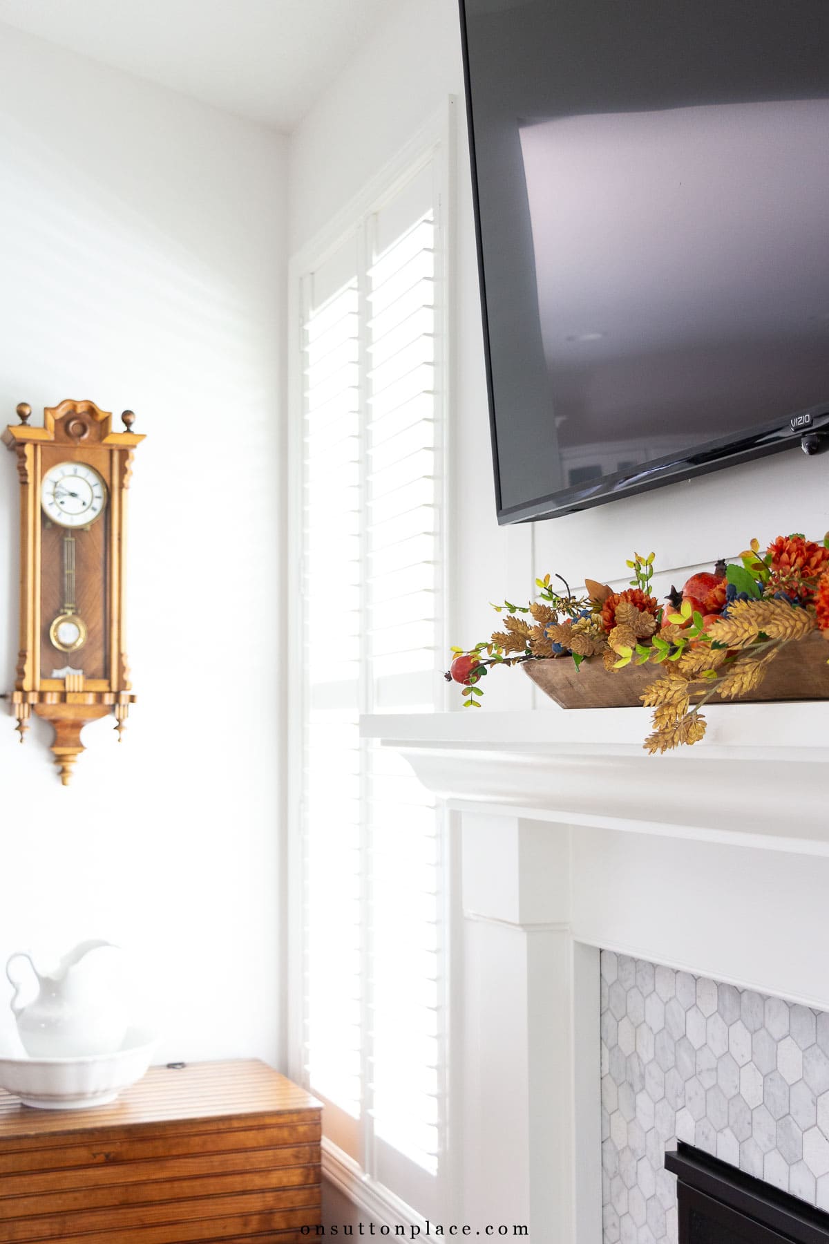 fall mantel decor wood dough bowl under tv