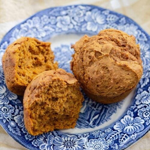 pumpkin spice muffins with spice cake mix on blue plate